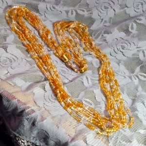 Multi-strand gold beaded necklace